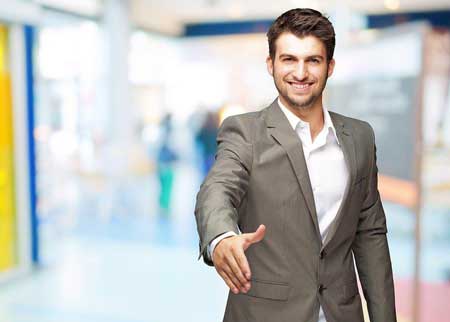 businessman welcome handshake